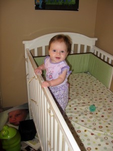 Standing in her crib